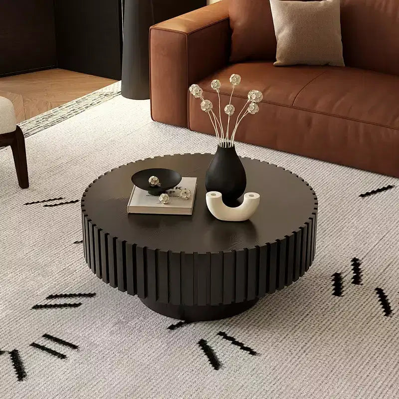 Round Coffee Table with Handcrafted Olive-Shaped Relief and Sturdy Pedestal Base